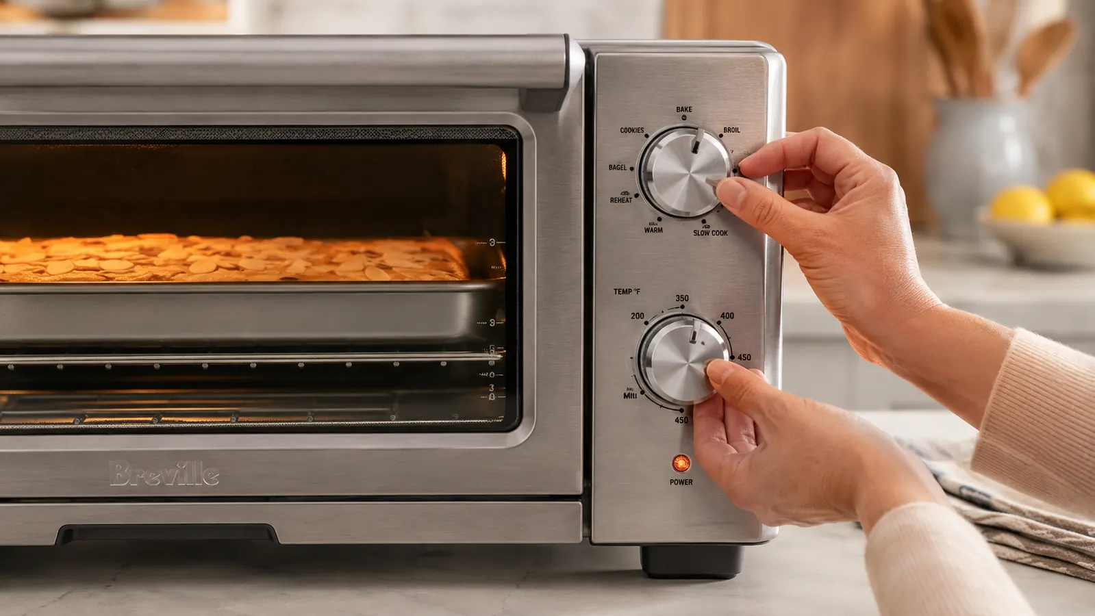 Close-up of the Breville Smart Oven Pro control knobs showing the Bake function and temperature dial set to 325 degrees